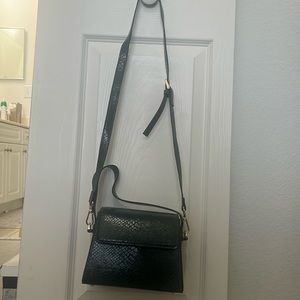 Dark green faux snake skin purse